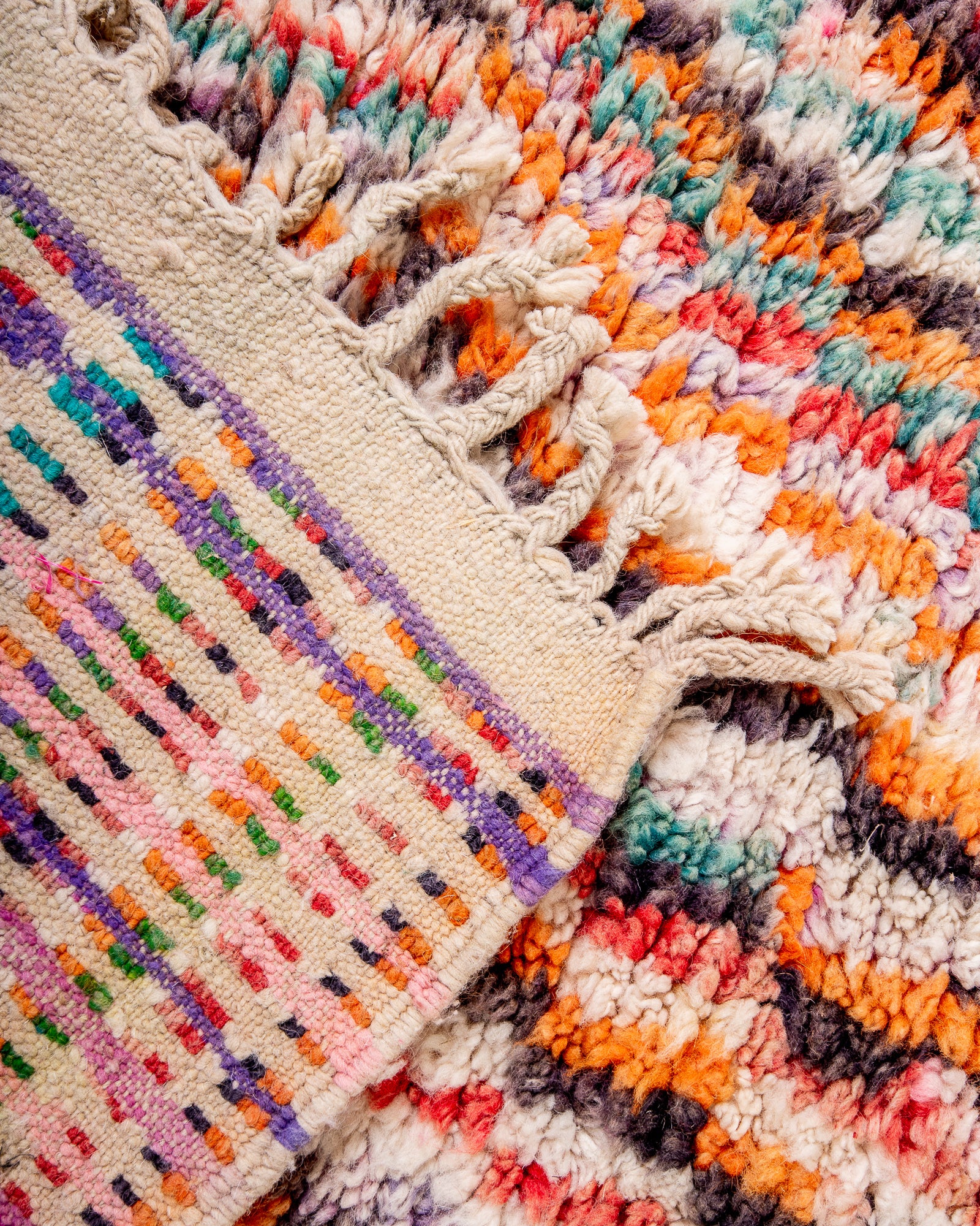 Modern designer handcrafted Berber rug from Morocco. Boujed with beautiful colors and patterns